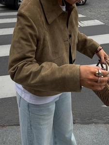 Street style view of brown suede jacket with buttons and collar details for women