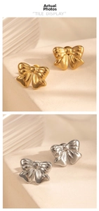 Macro detail of bow-shaped stud earrings in gold and silver matte finish