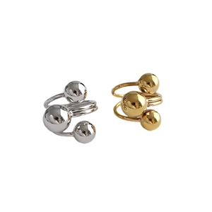 Auffällige unregelmäßige Planetenringe in Gold und Silber mit dreifachem Kugeldesign