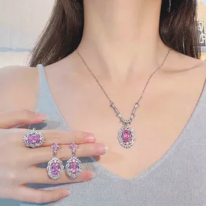 Pink oval gemstone jewelry set including necklace, ring and earrings for women