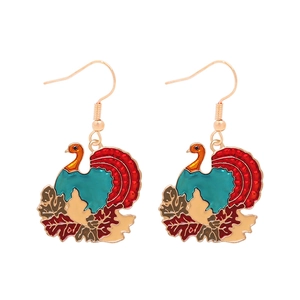Detailed close-up of colorful enamel turkey earrings with polished gold-tone metal finish