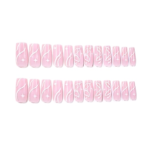 Pink long square press-on nails with white butterfly lines and star glitter decorations