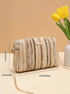 Detail showing colorful woven straw crossbody bag with gold chain and dimension labels