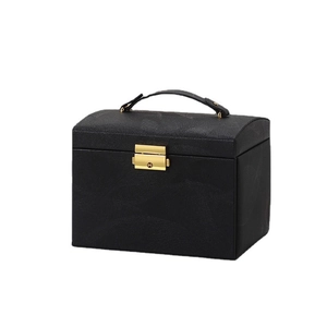 Elegant black PU leather jewelry box with golden handle and secure metal clasp closure