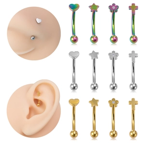 Detail view of multi-shape stainless steel eyebrow rings on silicone ear models