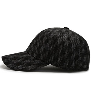 Black stretch fitted baseball cap with unique woven texture and striped grid pattern
