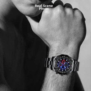 Macro shot of a men's business chronograph watch with blue dial and steel strap