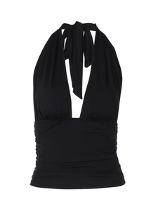 Detail of black halter V-neck top showing ruched fabric texture and slim fit design