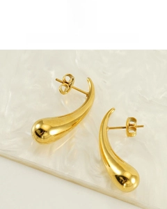 Detail of 18K gold vacuum plated water drop earrings with polished finish and butterfly backs