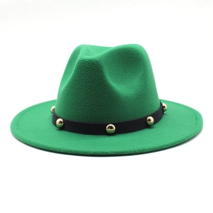 Detail of green wool fedora hat featuring black ribbon band with gold metal rivets decoration