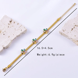 Detail of gold floral bracelet with colorful cubic zirconia and product dimensions