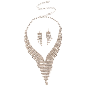 Elegant silver V-shaped diamond jewelry set with fringe earrings on white background