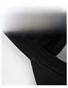 Detail of wide sweatband and breathable mesh fabric inside the black baseball cap