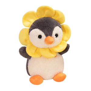 Creative penguin plush toy with yellow sunflower petals decor on white background
