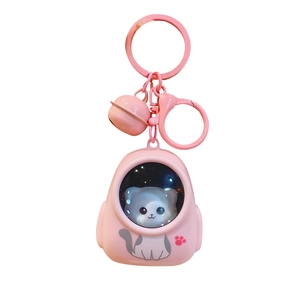 Pink cat space capsule glowing keychain with metal ring and matching small bell
