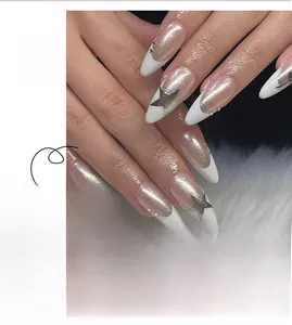 Detail of almond-shaped French press-on nails with silver stars and tiny rhinestones