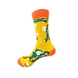 Detailed knit texture of mid-calf socks with yellow mermaid and lemon patterns