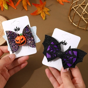 Halloween bow hair clips with sequin pumpkin and black bat wings for party styling