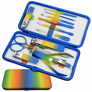 Rainbow manicure set with stainless steel nail clippers and tools in a blue storage box