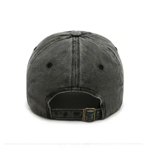Detail of washed grey cotton denim baseball cap showing vintage metal buckle closure