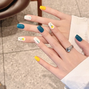 Hand-painted floral press-on nails in Morandi yellow and blue palette, square-oval shape