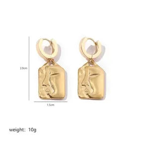 Fashionable gold stainless steel rectangular earrings with embossed face portrait design
