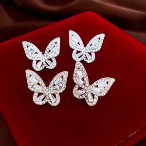 Boucles d'oreilles papillon de luxe avec zircones étincelants en plaqué or et argent