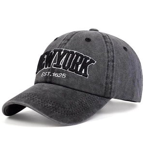 Close-up of vintage washed cotton baseball cap with 3D NEW YORK embroidery detail