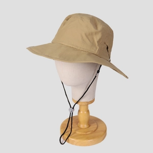 Detail of khaki nylon sun hat with adjustable drawstring on a mannequin head