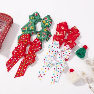 Christmas bow hair clips set with reindeer and polka dot patterns for girls festive styling