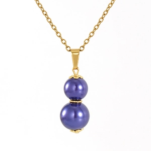 Detail of a purple pearl gourd pendant on a delicate gold titanium steel chain necklace