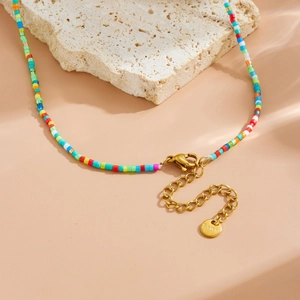 Colorful acrylic beaded necklace with gold stainless steel lobster clasp and logo tag