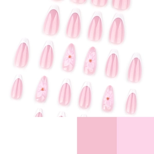 Faux ongles French rose et blanc avec fleurs 3D sculptées et perles dorées