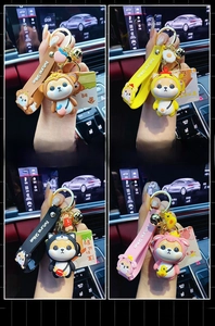 Detail of Shiba Inu zodiac keychains including Monkey, Rooster, Dog, and Pig designs