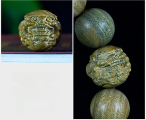 Macro view of hand-carved sandalwood beads showing detailed texture and patterns