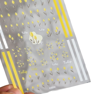 3D embossed nail stickers featuring yellow tulip floral designs for creative nail art decoration