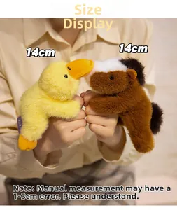 Detailed view of plush animal magnets showing soft yellow duck and brown horse toys