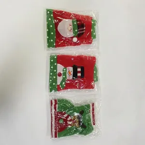 Detailed view of Christmas Santa themed cutlery bags with ruler measuring dimensions
