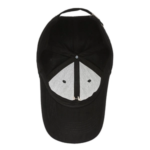 Interior view of black cotton baseball cap with adjustable metal buckle and breathable lining