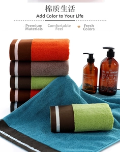 Detailed texture of thickened cotton towels with colored stripes and bright soft finish