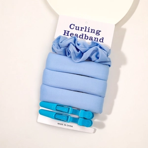 Blue heatless curling headband set with matching hair tie and two plastic hair clips