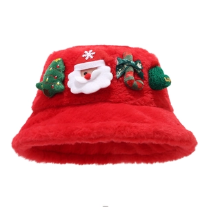 Plush red Christmas bucket hat with festive decorations of Santa Claus and a Xmas tree