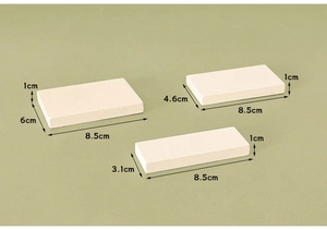 Detailed view of three miniature dollhouse stair blocks with precise 1cm thickness dimensions