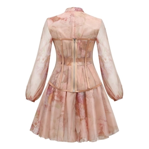Detail of pink floral dress back with corset structure and invisible zipper design