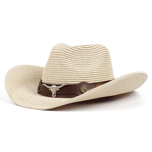 Linen Panama hat with brown leather band and silver longhorn bull skull emblem