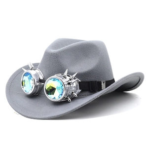 Grey felt cowboy hat with steampunk goggles featuring silver spikes and kaleidoscope lenses