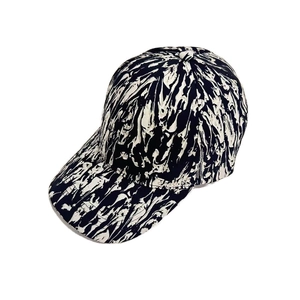 Classic baseball cap with black and white abstract graffiti pattern on white background