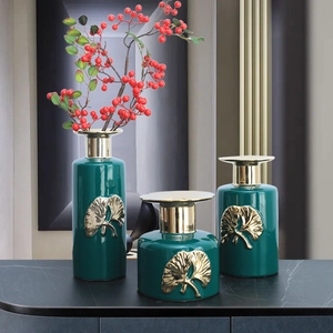Three-piece dark green ceramic vase set with golden ginkgo leaves and red berries