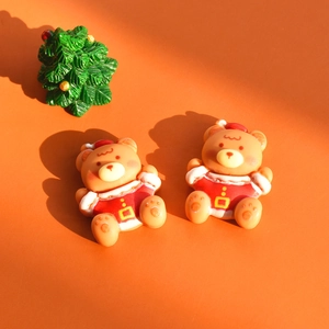 Detailed view of cute Christmas bear resin charms and mini green tree for DIY crafts