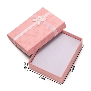 Detailed size view of pink jewelry gift box with bow, dimensions 9x7x2.9cm with sponge insert